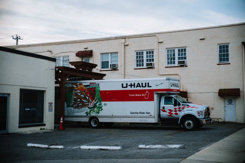 Moving truck outside a residential home, ready for a seamless move